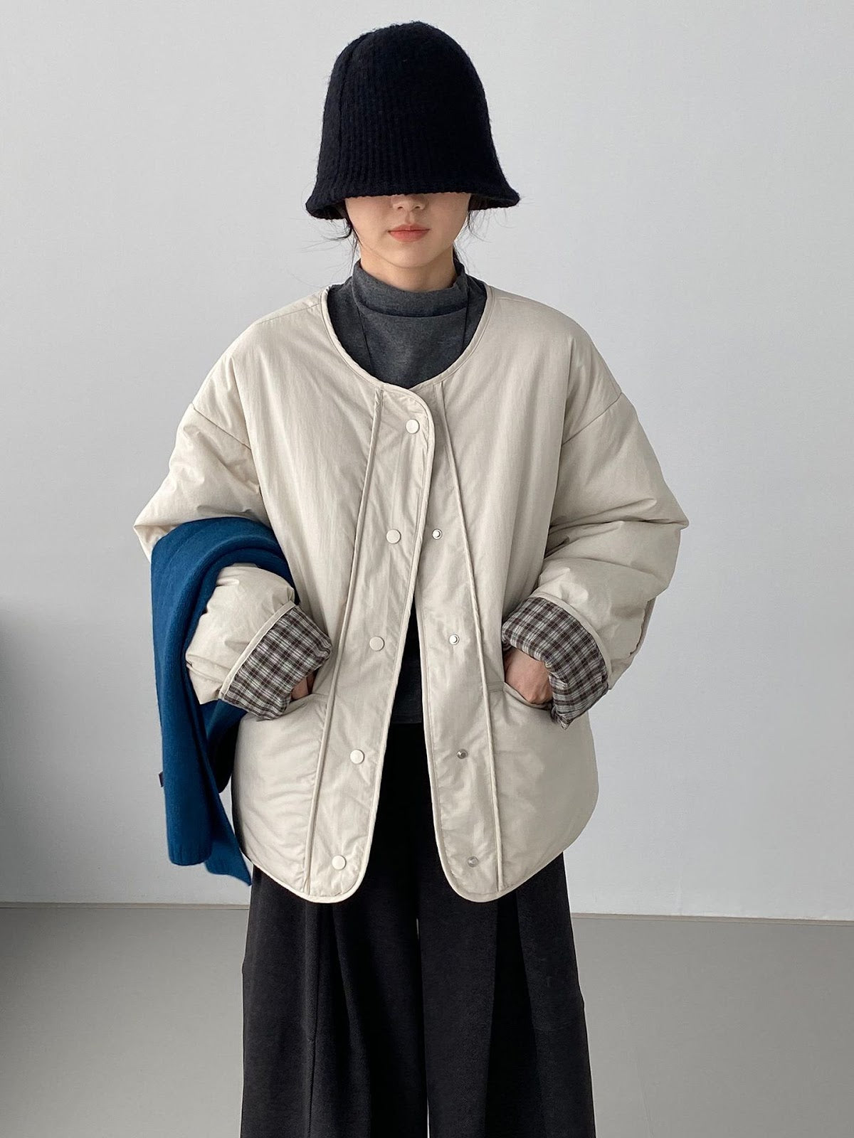 Loose women's quilted jacket in check pattern