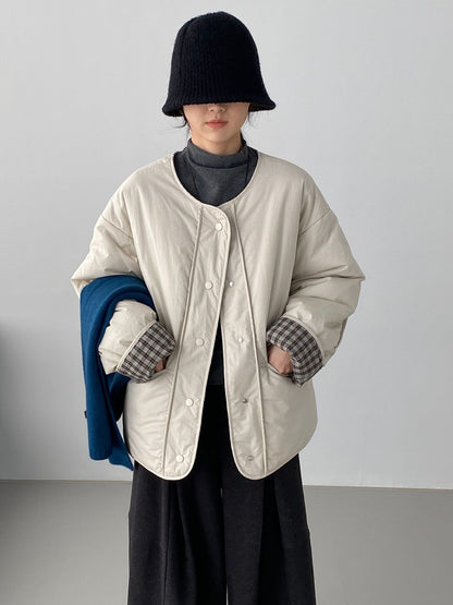 Loose women's quilted jacket in check pattern