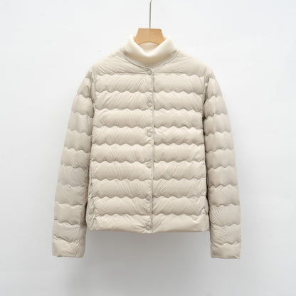 Light women’s down jacket with round neck and wave pattern