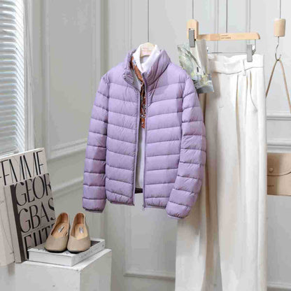 Light women's down jacket with stand-up collar, white duck down