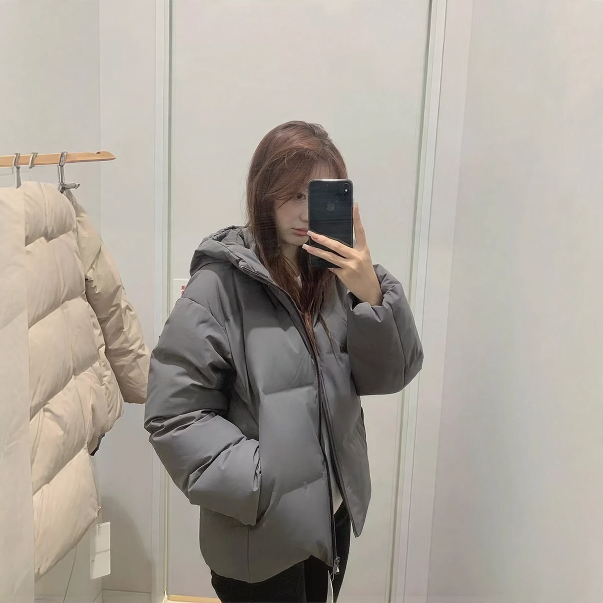 Padded women's winter jacket with hood