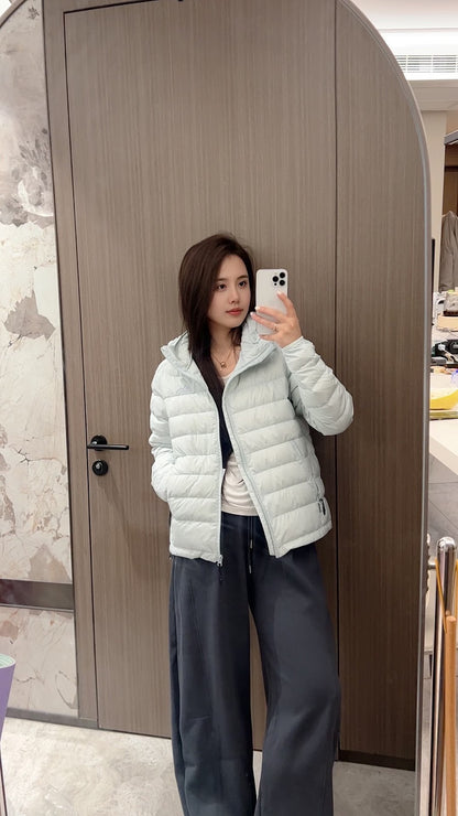 Short women's down jacket with hood