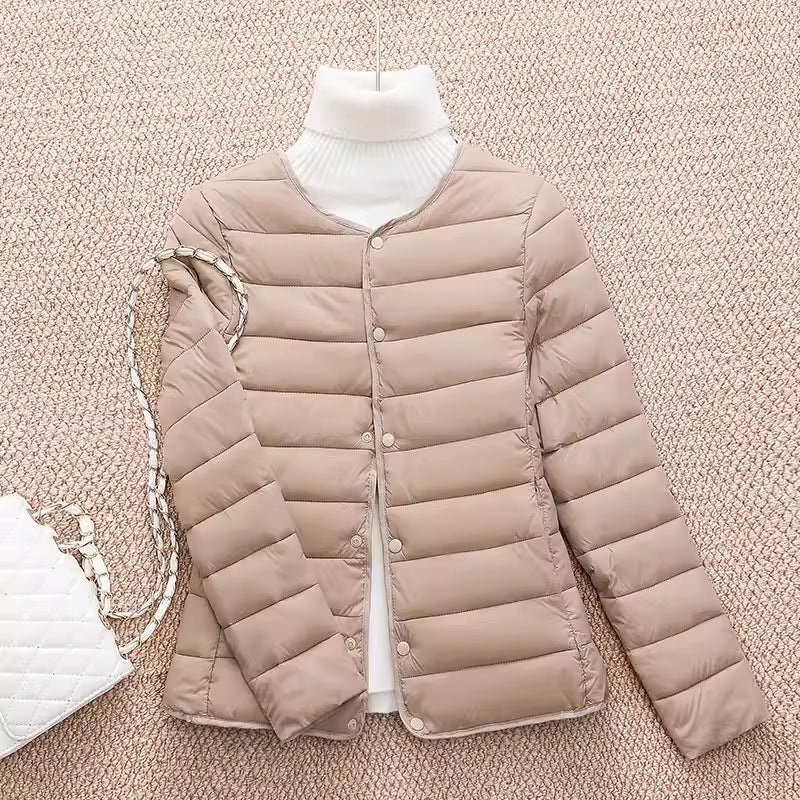 Light women's quilted jacket, short, tailored