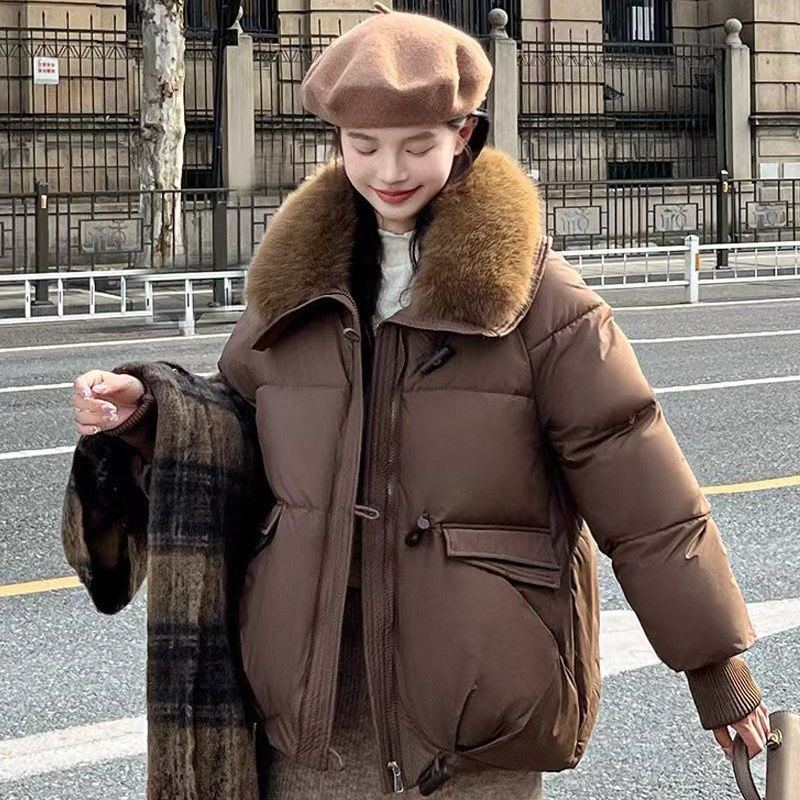 Short women's winter jacket with faux fur collar