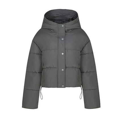 Short quilted jacket for women with stand-up collar and button placket
