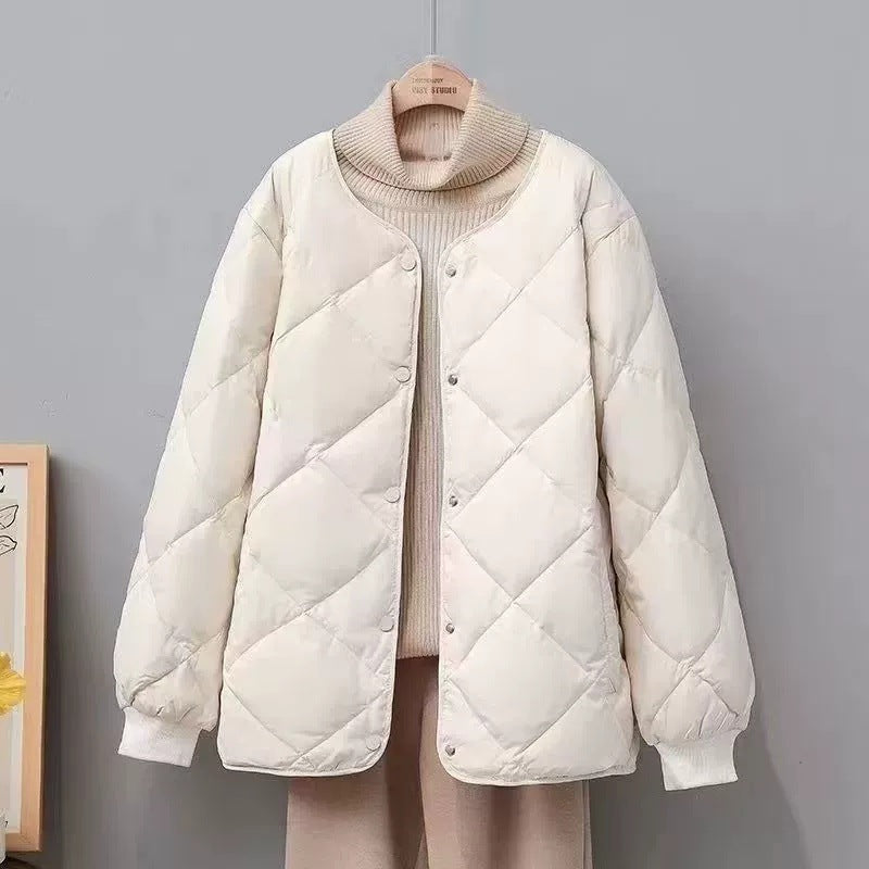 Short, quilted women's jacket with round neck