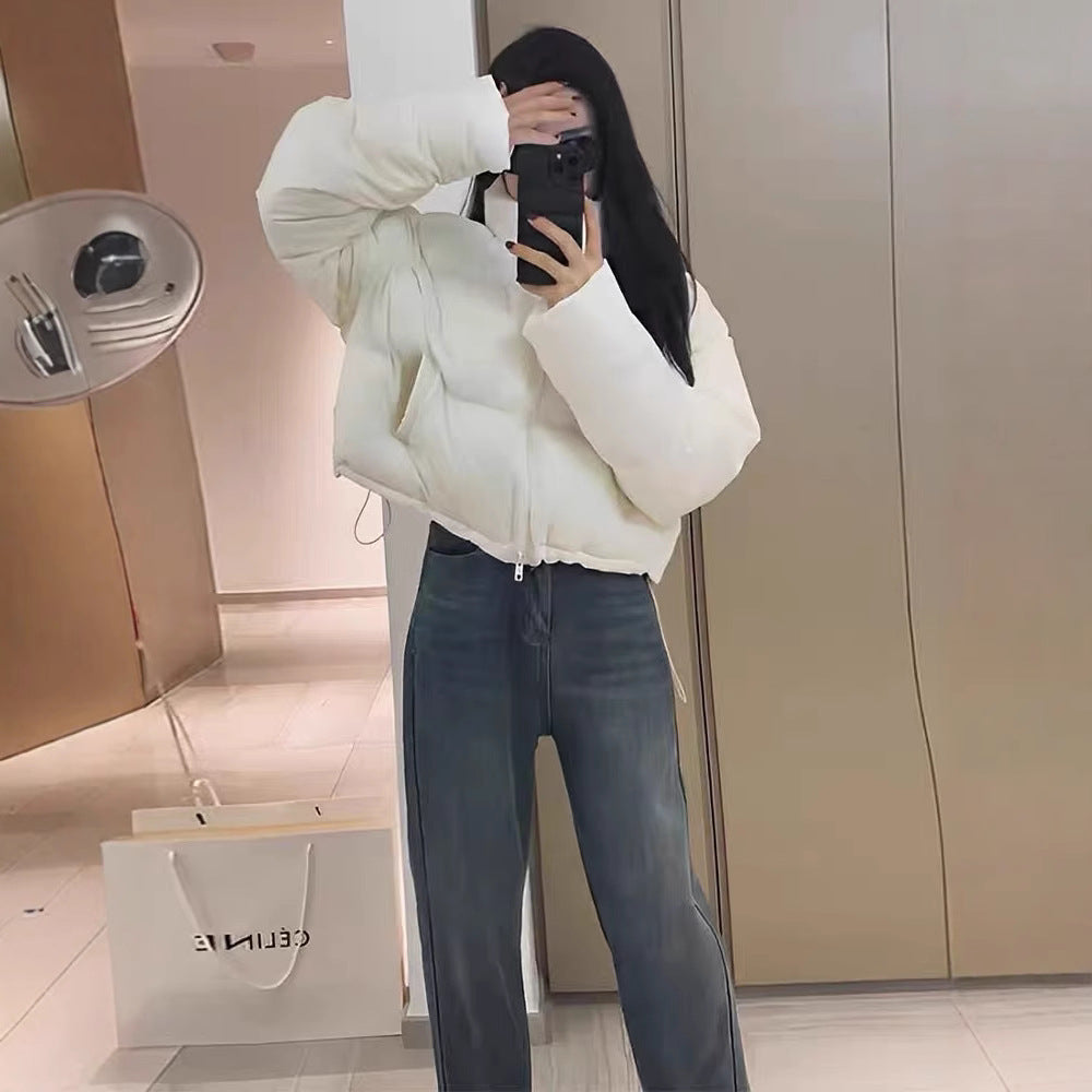 Short women's quilted jacket with stand-up collar, lined