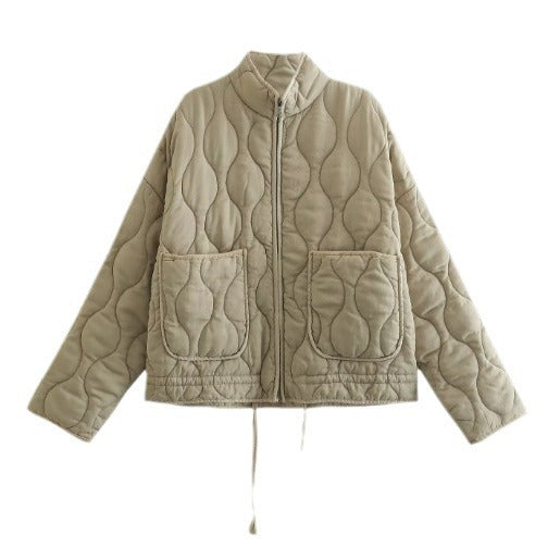 Women's quilted jacket with standing collar and tie belt