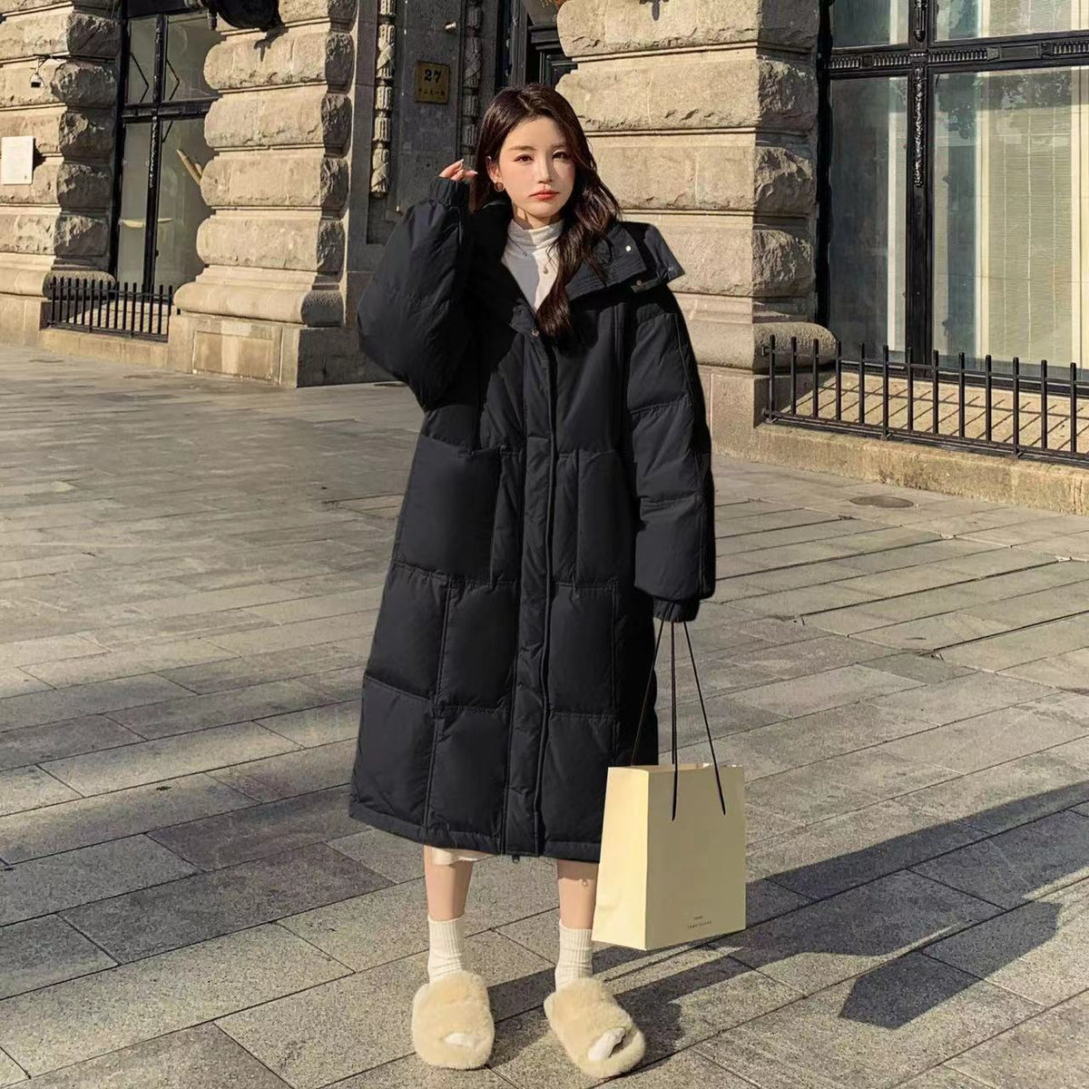 Long women's winter jacket with hood