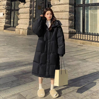 Long women's winter jacket with hood