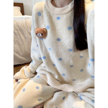 Warmer women's house suit made of plush, knit look