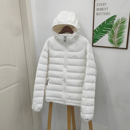 Light women's down jacket with hood, quilted