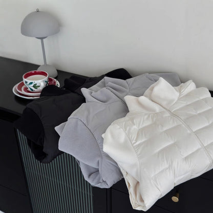 Light down jacket with fleece inserts and stand-up collar
