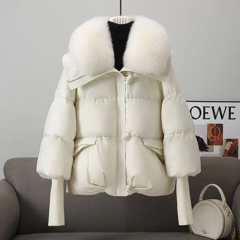 Short women's winter jacket with faux fur collar, padded