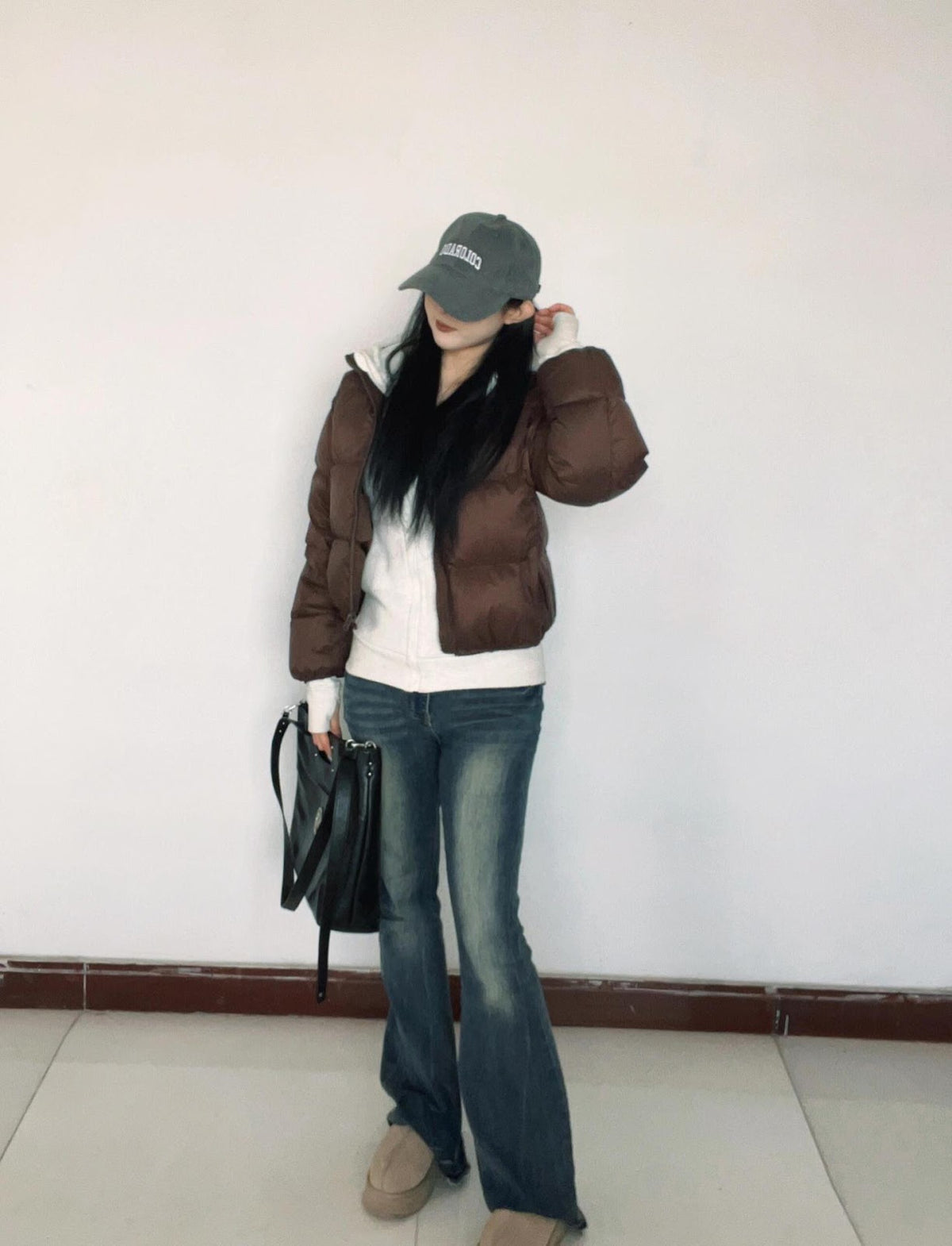 Short women's down jacket with white duck down filling