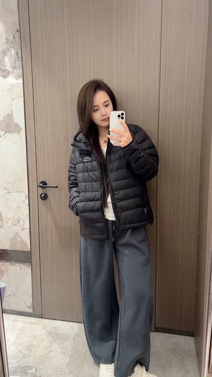 Short women's down jacket with hood