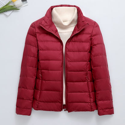 Light women's padded jacket, short, with hood
