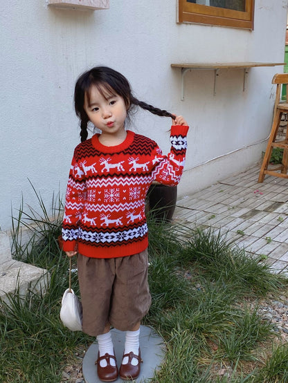 Christmas sweater with snowflake and reindeer motif