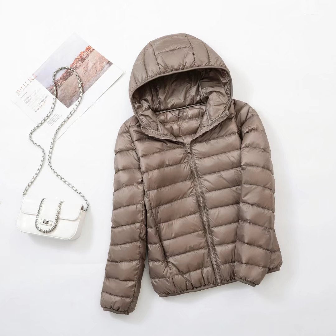Light women's down jacket with hood, slim fit