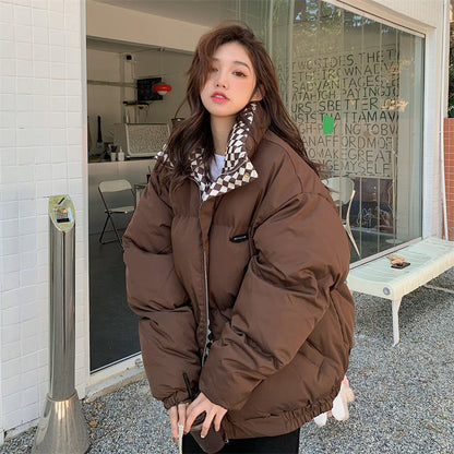 Short, padded women's jacket in oversized style