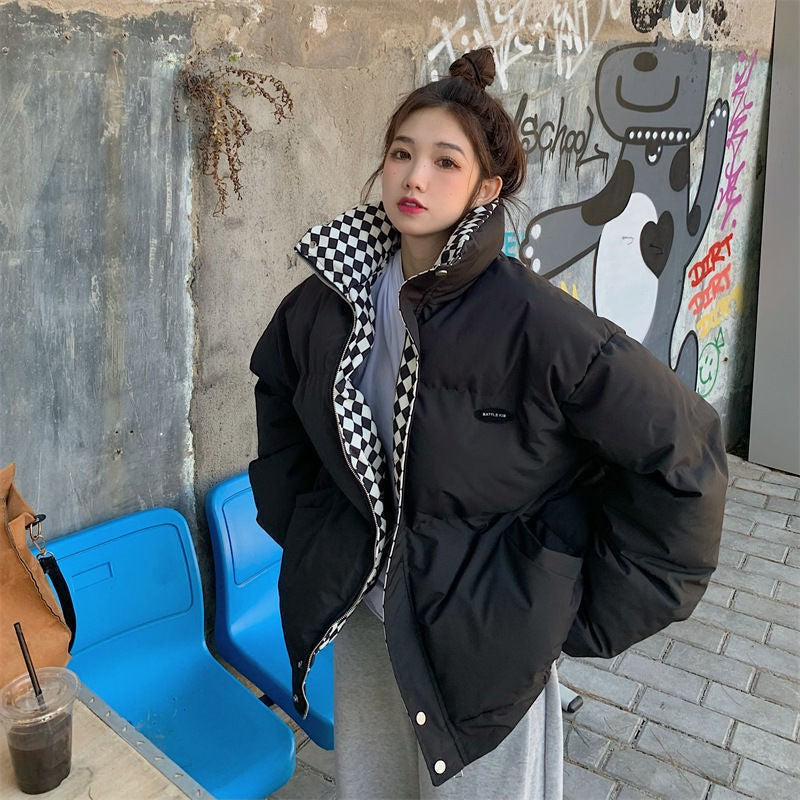 Short, padded women's jacket in oversized style