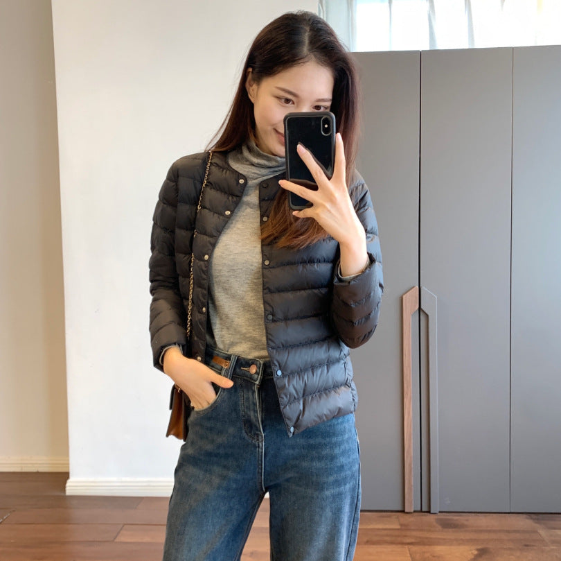Light women's down jacket, short, with goose feathers