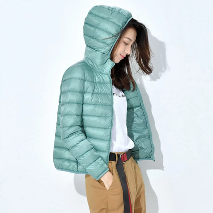 Light women's quilted jacket with hood
