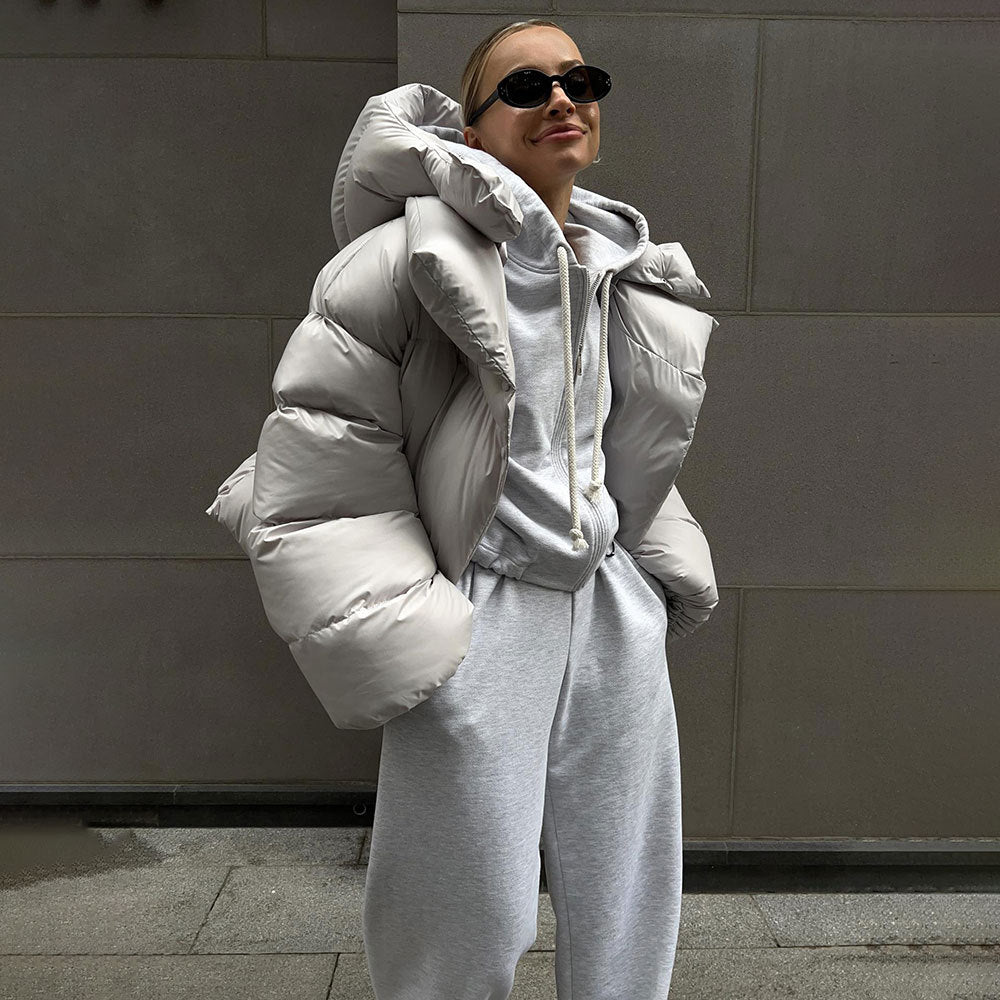 Short women's quilted jacket with hood