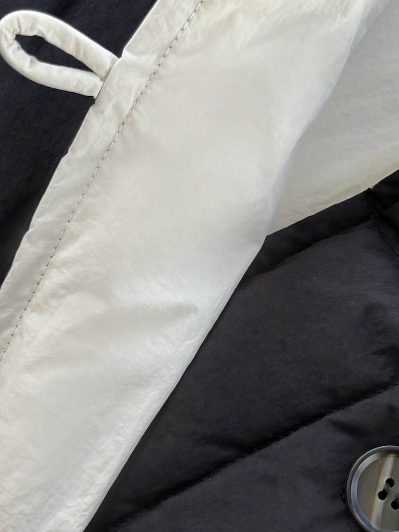 Reversible down jacket with stand-up collar