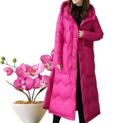 Long down jacket in vintage style with toggle closures