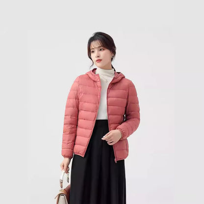 Light women's quilted jacket with hood