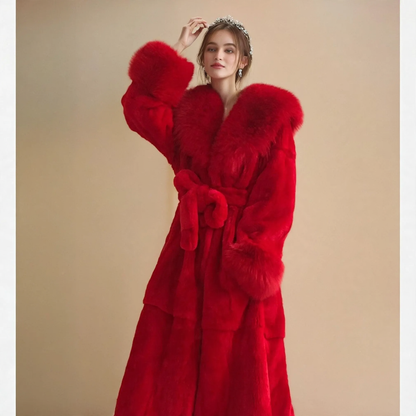 Long women's coat with faux fur collar