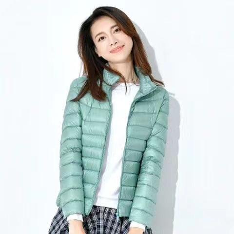Light women's quilted jacket with hood