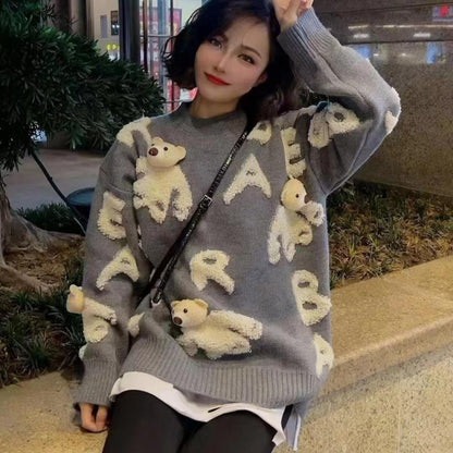 Soft knit sweater with removable bear motif