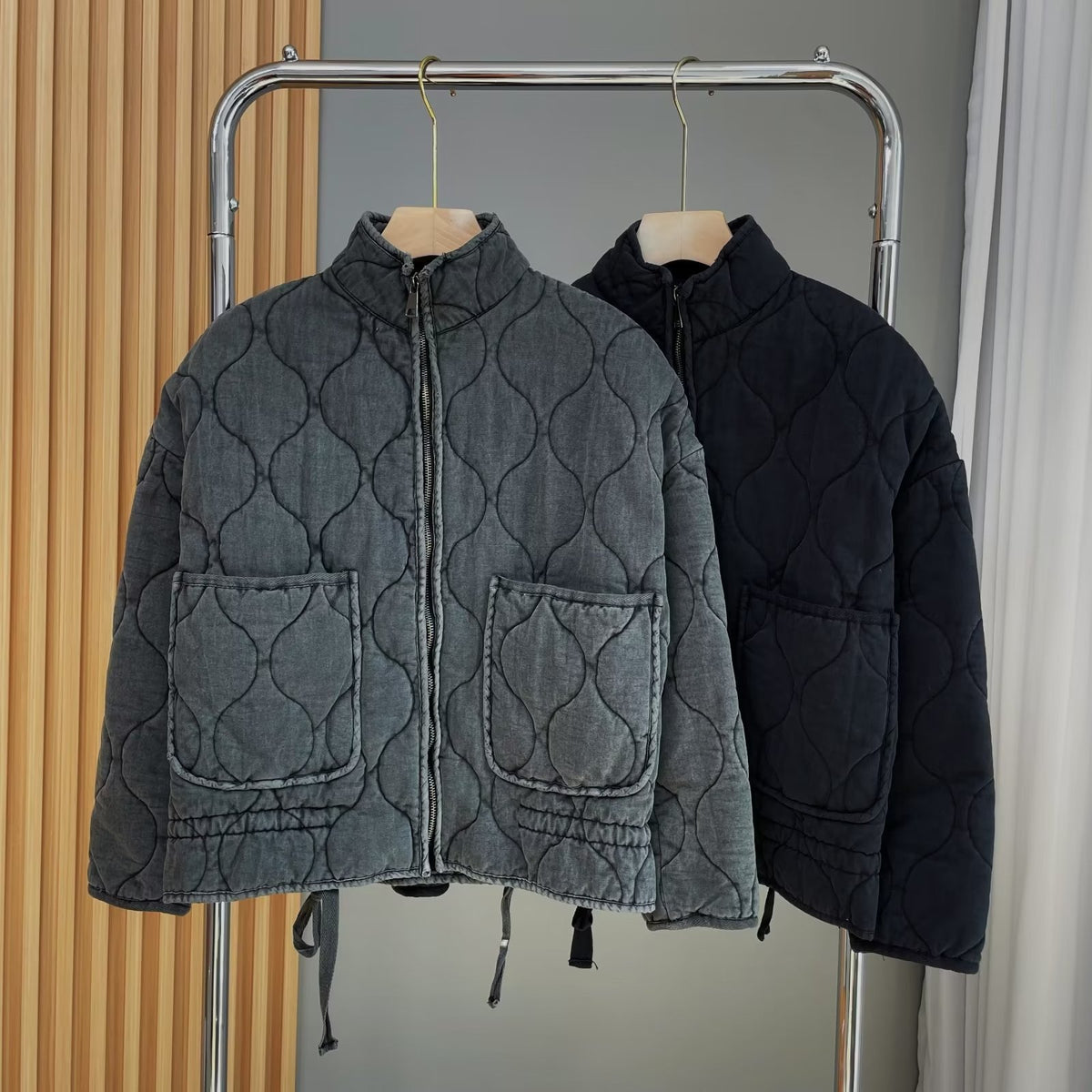Women’s quilted jacket with stand-up collar and tie belt