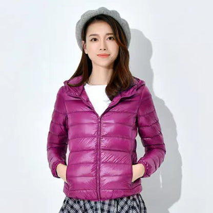 Light women's quilted jacket with hood