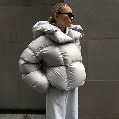 Short women's quilted jacket with hood