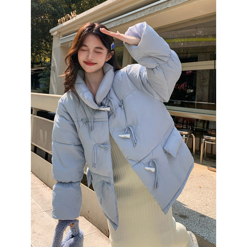 Short women's padded jacket in oversized look with toggle buttons