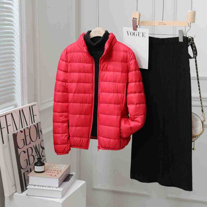 Light women's down jacket with stand-up collar, white duck down