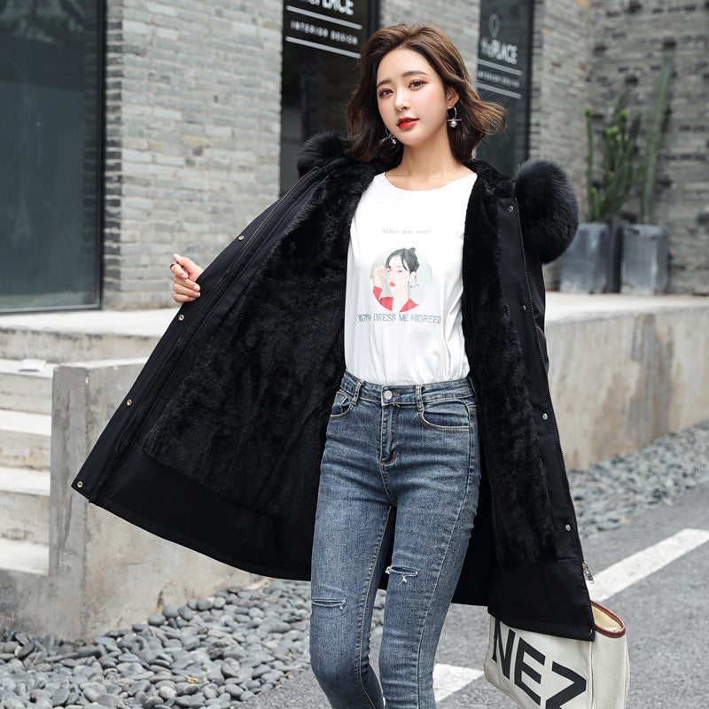 Padded parka with lamb fleece and fur collar for women