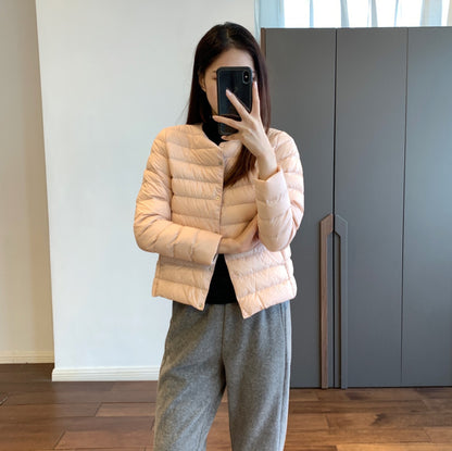 Light women’s down jacket, short, with goose feathers