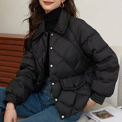 Short women's quilted jacket in diamond design