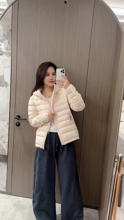 Short women's down jacket with hood