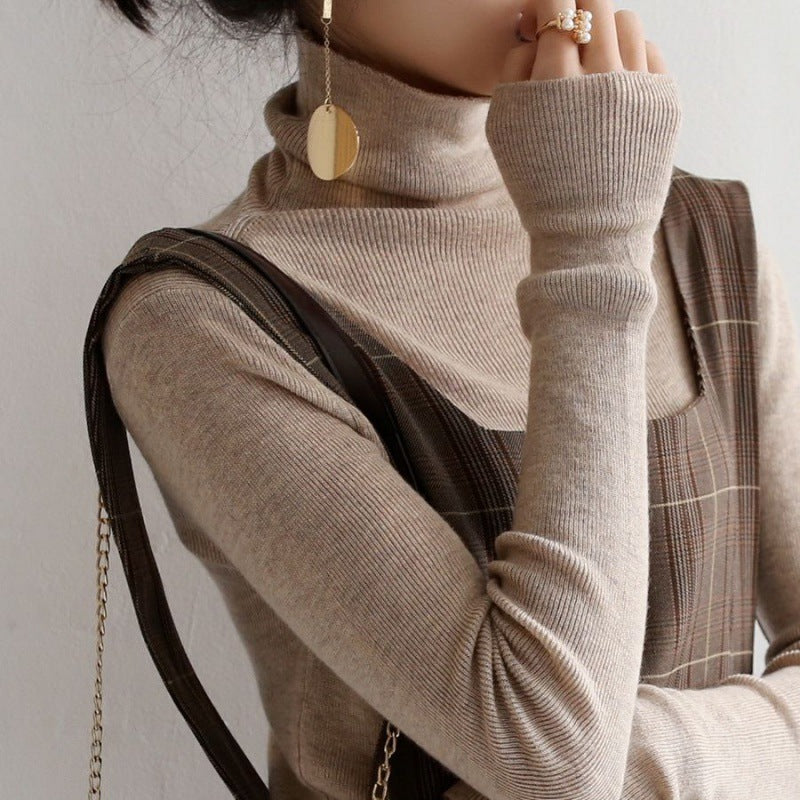 Narrow turtleneck knitted sweater