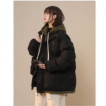 Padded women's winter jacket in layered look