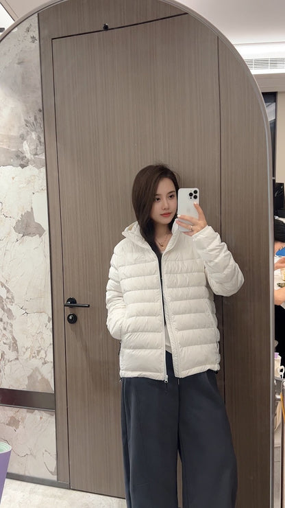 Short women's down jacket with hood