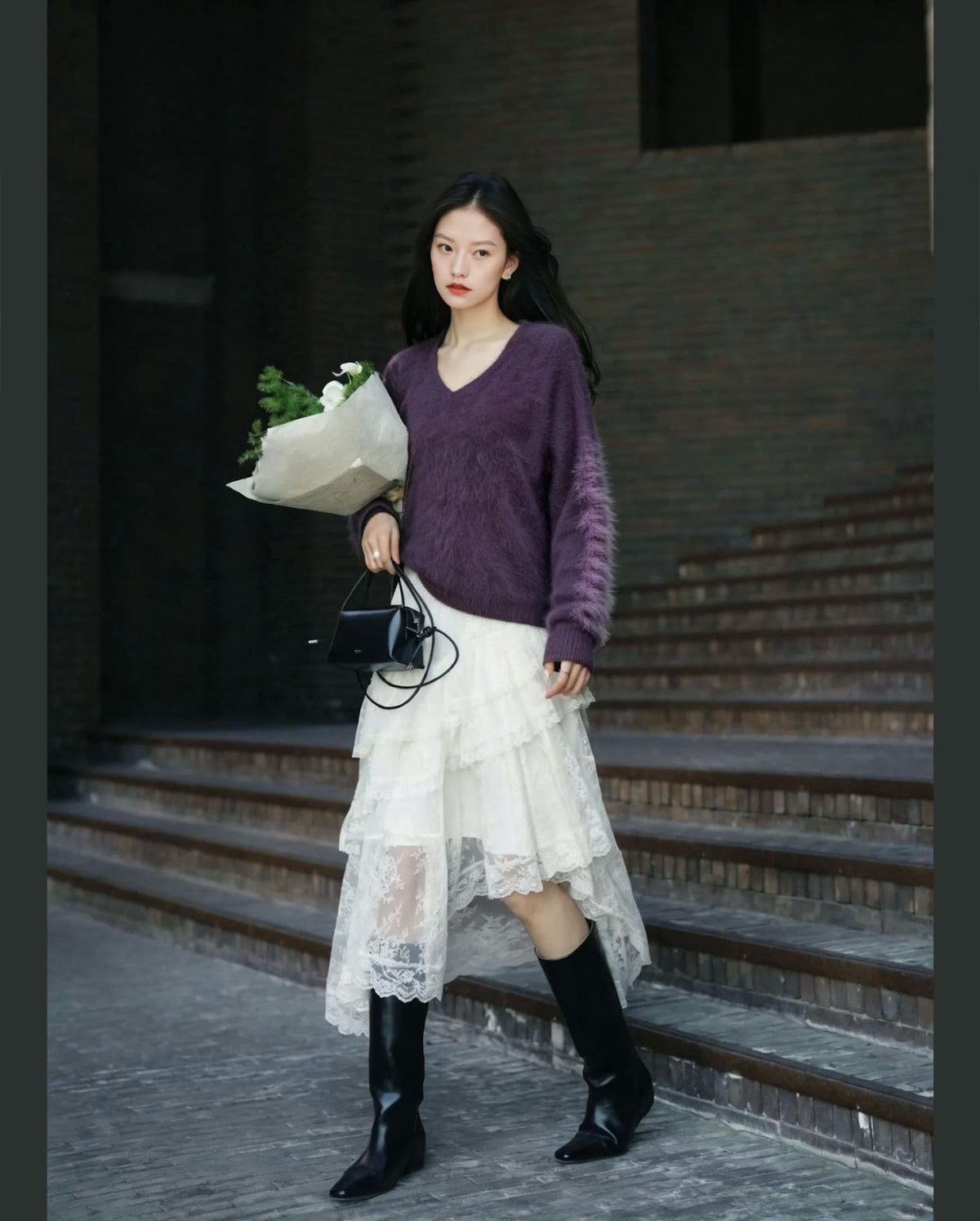 Women's knit sweater made of wool blend with V-neck