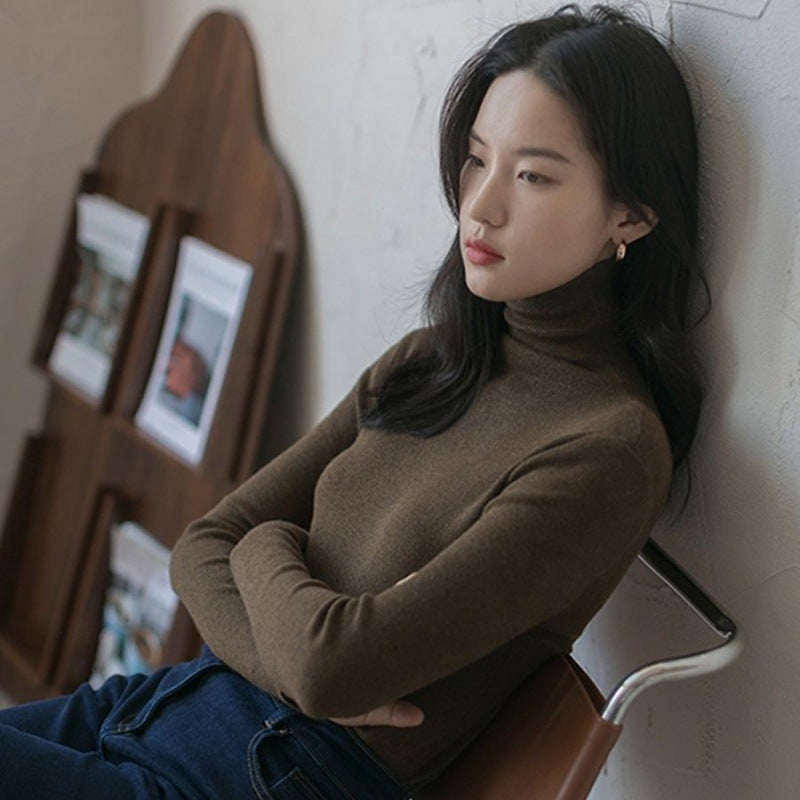 Narrow turtleneck knitted sweater