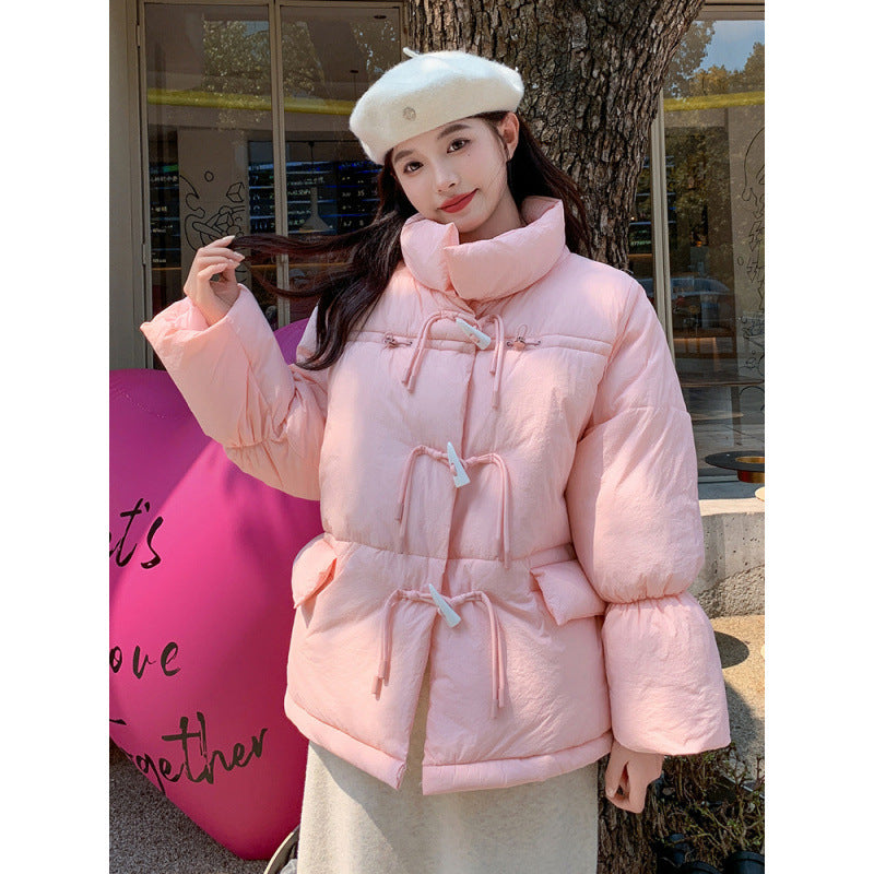 Short women's quilted jacket in oversized look with toggle buttons