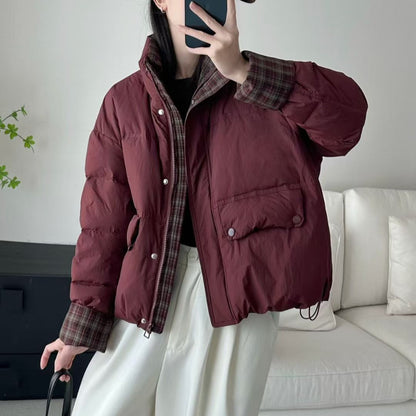 Short women's down jacket with high filling volume